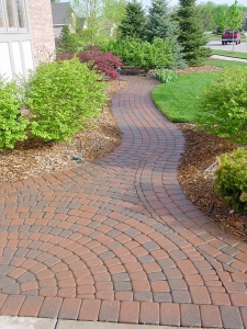 brick paver walkway
brick paver sidewalk
landscaping
shrubs
bushes